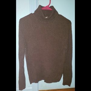 Long sleeved brown turtle neck sweater
